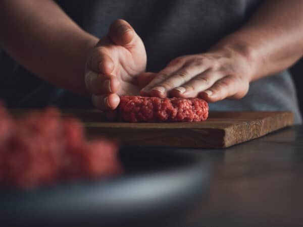 Shaping a beef burger patty for the grill
