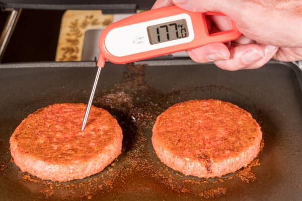 Digital meat thermometer to measure hamburger temperature