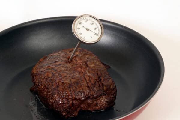 Steak in Pan with thermometer