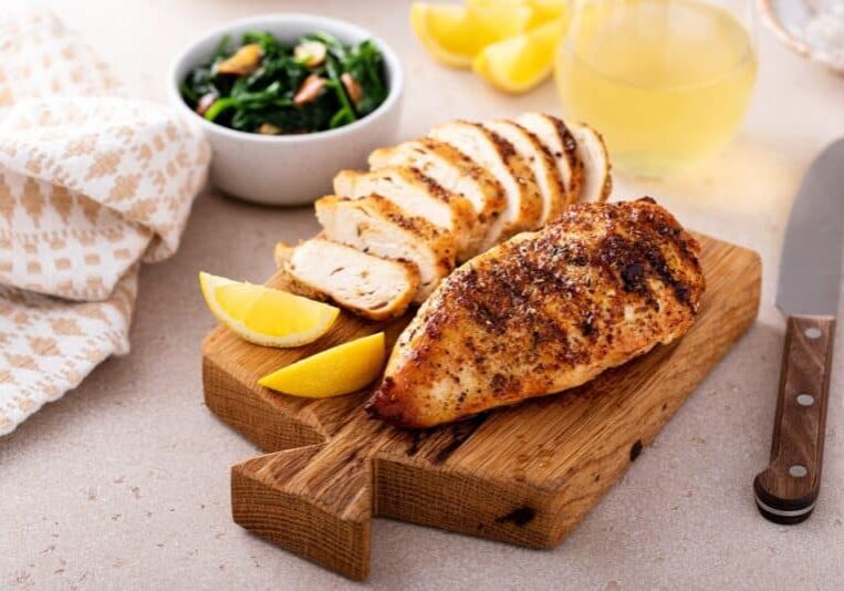 Grilled,Chicken,Breast,With,Spice,Rub,And,Lemon,On,A